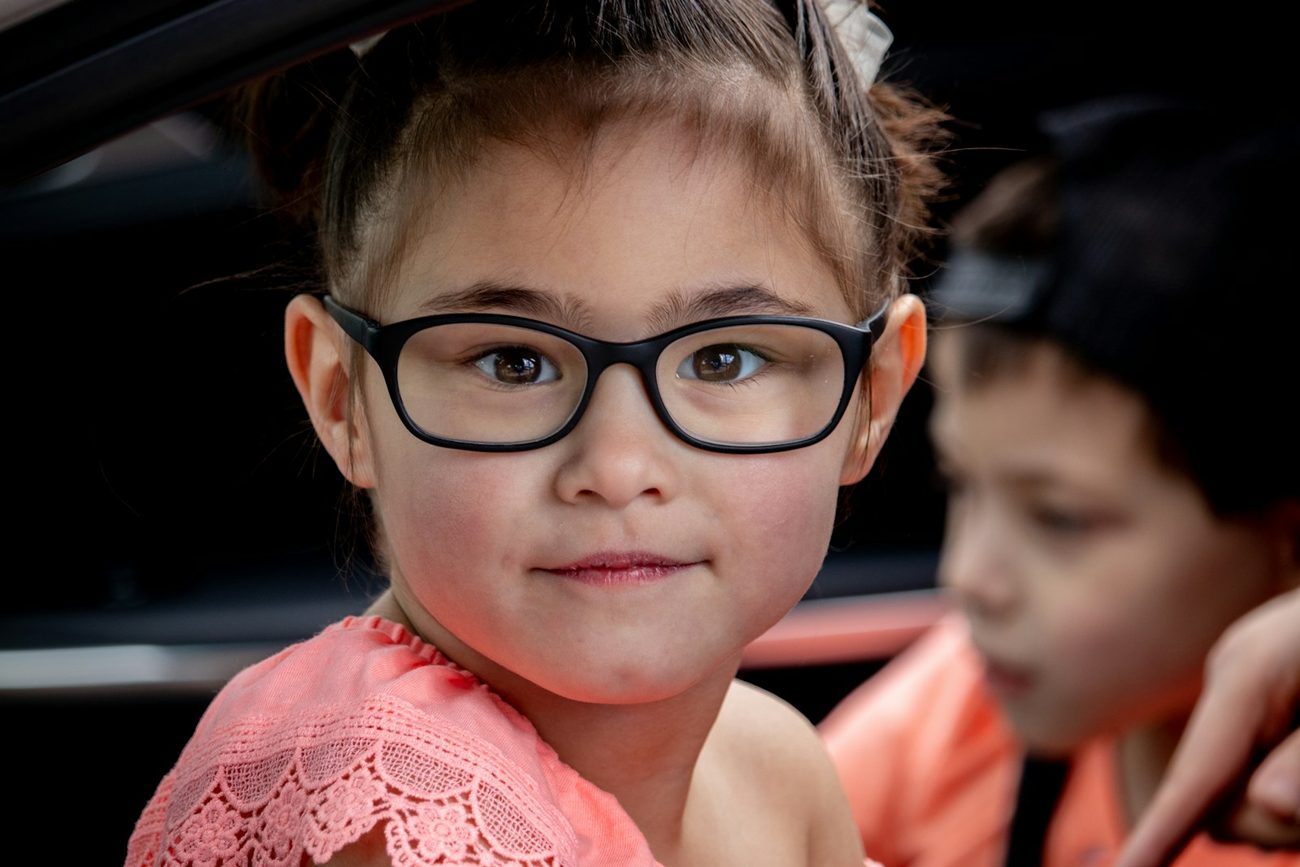Young child wearing glasses after an eye test